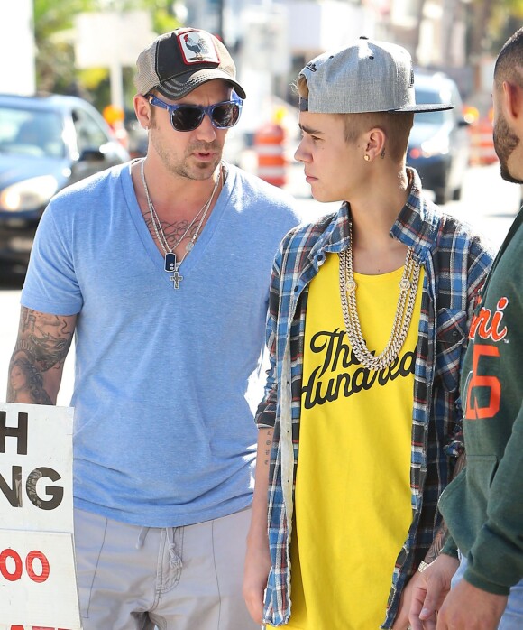 Justin Bieber et son père, à Miami, le 22 janvier 2014.