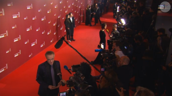 Christophe Lambert (en bas), Jean-Hugues Anglade et sa compagne qui posent, aux César 2016.