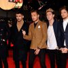 Les One Direction lors de la 15e édition des NRJ Music Awards au Palais des Festivals à Cannes le 14 décembre 2013.