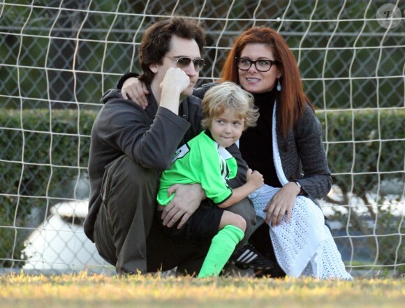 Debra Messing et Daniel Zelman avec leur fils Roman à Los Angeles, le 11 octobre 2009