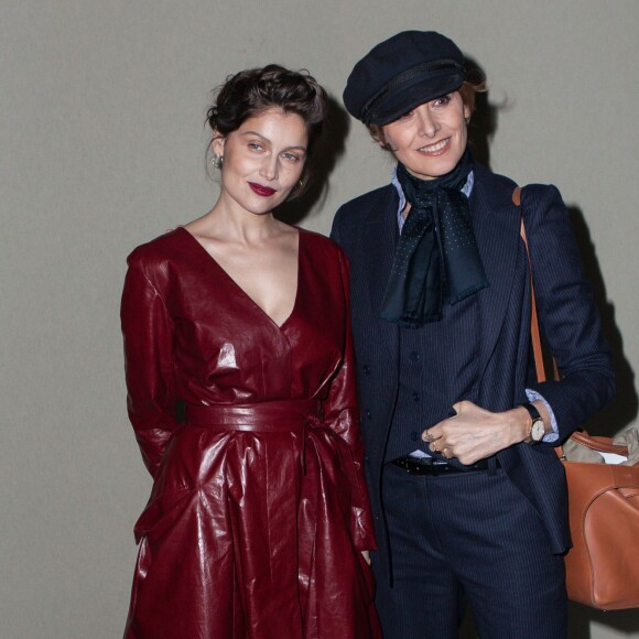 Laetitia Casta et Inès de la Fressange assistent au défilé Nina Ricci (collection automne-hiver 2016-2017) au Grand Palais. Paris, le 5 mars 2016.