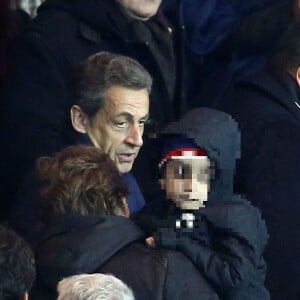 Nicolas Sarkozy et son petit-fils Solal, People au match de football PSG - Monaco au Parc des Princes le 20 mars 2016. © Cyril Moreau/Bestimage