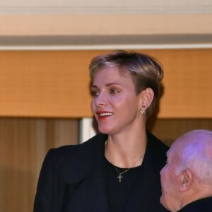 Le prince Albert II de Monaco et son épouse la princesse Charlène ont assisté à la traditionnelle procession du Vendredi Saint à Monaco, le 25 mars 2016. Le couple Princier était sur la petite terrasse du Palais pour saluer les participants. © Bruno Bebert/Bestimage