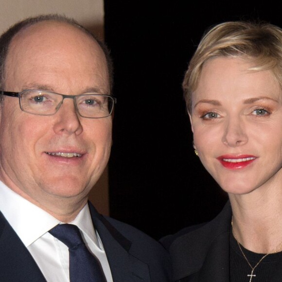 Exclusif - Le prince Albert II de Monaco et son épouse la princesse Charlène ont assisté à la traditionnelle procession du Vendredi Saint à Monaco, le 25 mars 2016. Le couple Princier était sur la petite terrasse du Palais pour saluer les participants. © Gaetan Luci/Palais princier/Bestimage