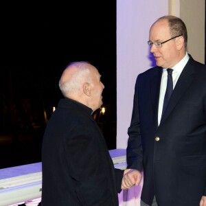 Exclusif - Le prince Albert II de Monaco et son épouse la princesse Charlène ont assisté à la traditionnelle procession du Vendredi Saint à Monaco, le 25 mars 2016. Le couple Princier était sur la petite terrasse du Palais pour saluer les participants. © Gaetan Luci/Palais princier/Bestimage