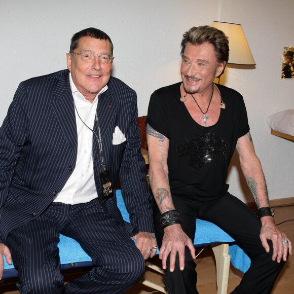 Exclusif - Jean Claude Camus et Johnny Hallyday lors d'un concert à l'Arena de Genève, le 28 octobre 2009