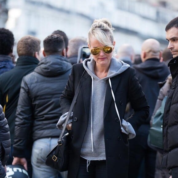 Exclusif : Johnny Hallyday et son épouse Laeticia se recueillent place de la Bourse à Bruxelles le 27 mars 2016