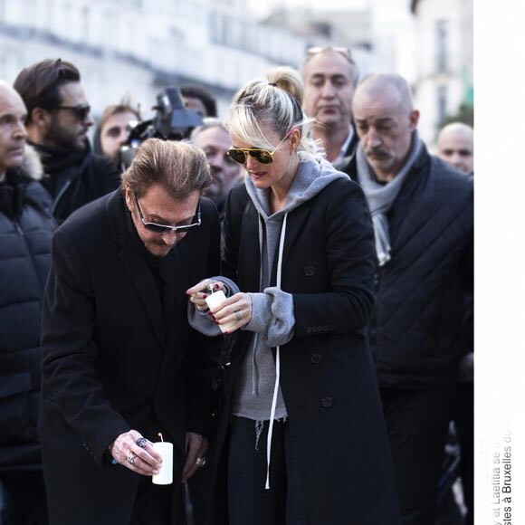 Exclusif : Johnny Hallyday et son épouse Laeticia se recueillent place de la Bourse à Bruxelles le 27 mars 2016