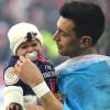 Javier Pastore et sa fille Martina en larmes à l'issue de la finale de la Coupe de la Ligue au Stade de France. Saint-Denis, le 23 avril 2016. © Cyril Moreau/Bestimage