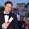László Nemes (Grand Prix pour le film "Saul Fia" (Le Fils de Saul)) - Photocall de la remise des palmes du 68e Festival du film de Cannes, à Cannes le 24 mai 2014.