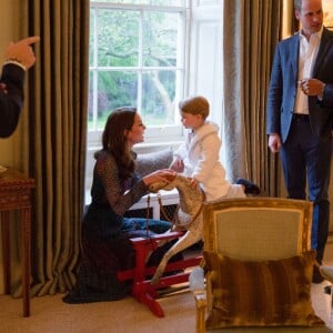 Barack Obama et sa femme Michelle Obama rendant visite au prince William et à sa femme Kate Middleton à Kensington Palace à Londres, le 22 avril 2016