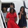 La première dame des Etats-Unis Michelle Obama, ses filles Malia et Sasha (Natasha) et sa mère Marian Robinson à leur accueil par Luigi Brugnaro et Luca Zaia lors de leur arrivée en avion à l'aéroport de Venise, le 19 juin 2015