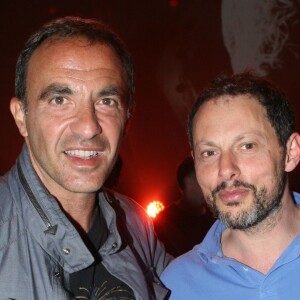 Nikos Aliagas et Marc-Olivier Fogiel - Jour 2 - People au concert de Michel Polnareff à l'AccorHotels Arena de Paris le 8 mai 2016.