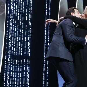 Laurent Lafitte (maître de cérémonie) et Catherine Deneuve (robe Gaultier Paris) s'embrassent sur la bouche - Cérémonie d'ouverture du 69ème Festival International du Film de Cannes.Le 11 mai 2016. © Borde-Jacovides-Moreau/Bestimage