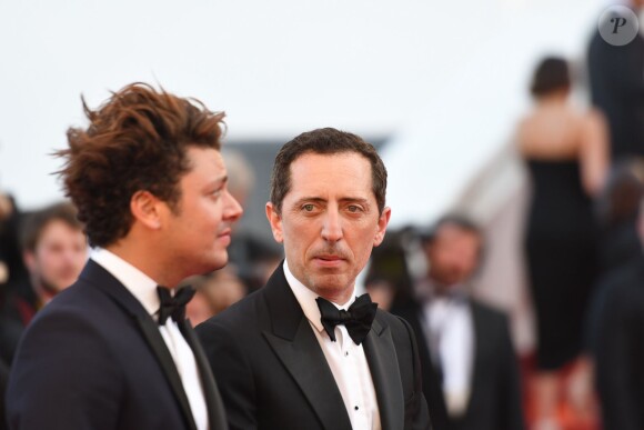 Kev Adams et Gad Elmaleh à la montée des marches du film "Elle" lors du 69ème Festival International du Film de Cannes. Le 21 mai 2016.