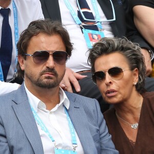 Henri Leconte et sa compagne Maria - People dans les tribunes lors du Tournoi de Roland-Garros (les Internationaux de France de tennis) à Paris, le 27 mai 2016. © Cyril Moreau/Bestimage