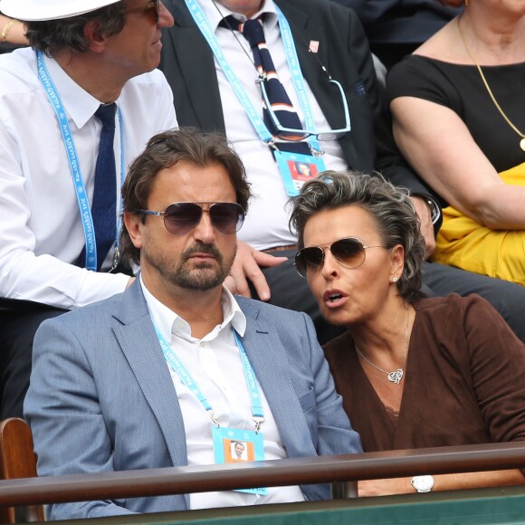 Henri Leconte et sa compagne Maria - People dans les tribunes lors du Tournoi de Roland-Garros (les Internationaux de France de tennis) à Paris, le 27 mai 2016. © Cyril Moreau/Bestimage