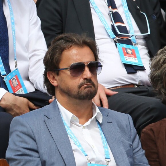 Henri Leconte et sa compagne Maria - People dans les tribunes lors du Tournoi de Roland-Garros (les Internationaux de France de tennis) à Paris, le 27 mai 2016. © Cyril Moreau/Bestimage