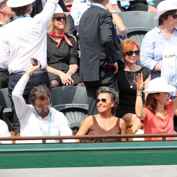 Henri Leconte et sa compagne Maria - People dans les tribunes lors du Tournoi de Roland-Garros (les Internationaux de France de tennis) à Paris, le 27 mai 2016. © Cyril Moreau/Bestimage