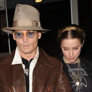 Johnny Depp emmene sa fiancée Amber Heard dans une librairie pour son anniversaire (28 ans) à New York, le 22 avril 2014.