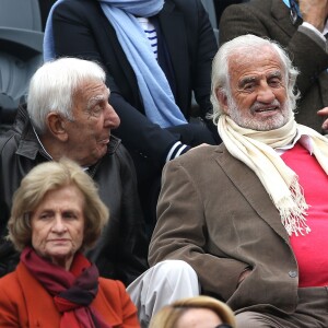 Charles Gérard et Jean-Paul Belmondo dans les tribunes de la finale homme des internationaux de France de Roland-Garros à Paris le 5 juin 2016. © Moreau-Jacovides / Bestimage