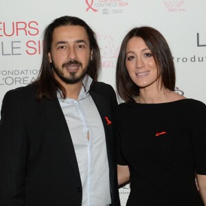 Archives - Moundir et sa femme Inès lors de l'opération " Coiffeurs Contre le Sida " édition 2014 à l'Académie L'Oréal Produits Professionnels à Paris, le 1er décembre 2014.