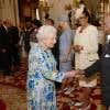 La reine Elizabeth II d'Angleterre salue Sir Elliott Belgrave, gouverneur général de La Barbade - Réception au Guidhall de Londres à la suite de la messe de l'anniversaire de la reine Elizabeth II le 10 juin 2016.