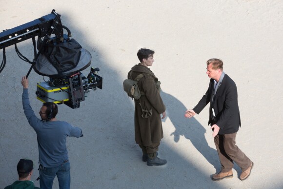 Exclusif - Prix spécial - No web - No blog - Christopher Nolan et Fionn Whitehead - Le réalisateur anglais Christopher Nolan sur le tournage du film "Dunkirk" sur la plage de Malo-les-Bains, à Dunkerque. Quatre navires de guerre, un chasseur Spitfire, deux hélicoptères, 1500 figurants et beaucoup de fumée... l'équipe du cinéaste Christopher Nolan a récréé un véritable champ de bataille! Le 27 mai 2016  For germany call for price English director Christopher Nolan on the movie set of ' Dunkirk ', in Dunkerque, France. A casting with Tom Hardy, Mark Rylance, Kenneth Branagh, Cillian Murphy, Fionn Whitehead, Aneurin Barnard, Harry Styles, James D'Arcy, Jack Lowden, Barry Keoghan, Tom Glynn-Carney and Damien Bonnard. A World War II drama focused on the evacuation of the French city of Dunkirk in May of 1940, following the Nazi invasion of France in the early stages of the war. 27th may 201627/05/2016 - Dunkerque