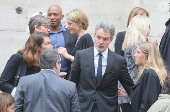 Julie Andrieu et son mari Stéphane Delajoux - Obsèques de Nicole Courcel en l'église Saint-Roch à Paris le 30 juin 2016.