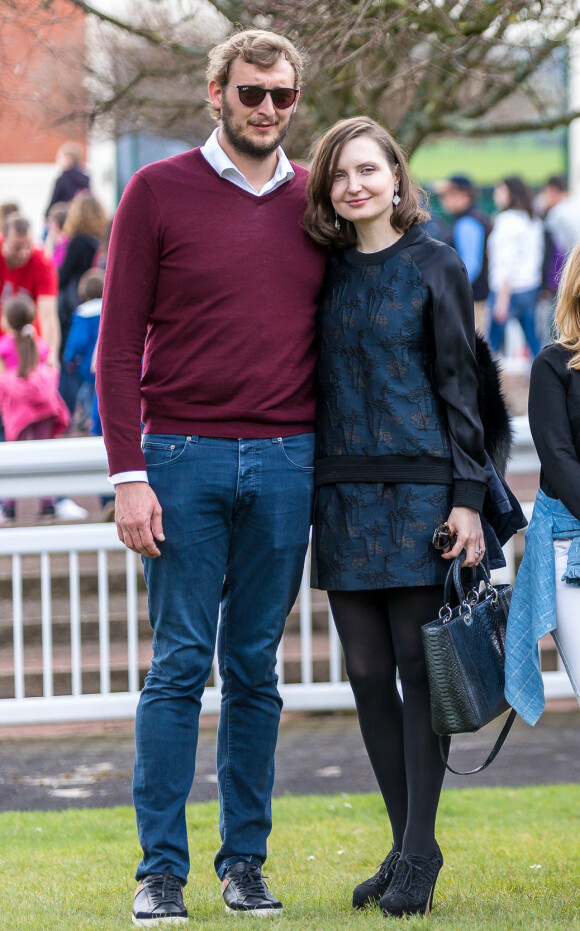 Amaury Leveaux et sa compagne Elizaveta - Les Dimanches au Galop à l'Hippodrome d’Auteuil, Paris le 3 avril 2016. Les Dimanches au Galop sont des sorties dominicales destinées aux familles pour une immersion ludique et sportive dans le monde des courses de chevaux. © Florian Leger / Share & Dare via Bestimage