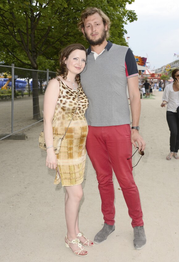 Amaury Leveaux et sa compagne Elizaveta enceinte à l'Inauguration de la Fête des Tuileries à Paris le 26 juin 2015.