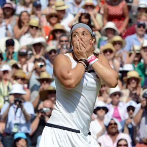 Marion Bartoli a remporté son tout premier succès en grand chelem en disposant de l'Allemande Sabine Lisicki 6-1, 6-4 en finale de Wimbledon à Londres le 6 juillet 2013.