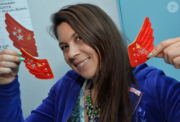 Marion Bartoli lance sa collection d'ailes "Wingista" au salon Who's Next à Paris le 27 janvier 2014.