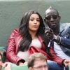 Mamadou Sakho et sa femme Majda dans les tribunes du tournoi de tennis de Roland Garros à Paris le 31 mai 2015.