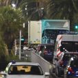 Attentat de Nice: Les officiers de la police judiciaire enquêtent autour du camion criblé de balles qui a tué plus de 80 personnes sur la promenade des anglais à Nice le 15 juillet 2016. Dès la fin du feu d'artifice du 14 Juillet, un homme au volant d'un camion blanc a foncé dans la foule sur près de 2 kilomètres. © Bruno Bebert / Bestimage