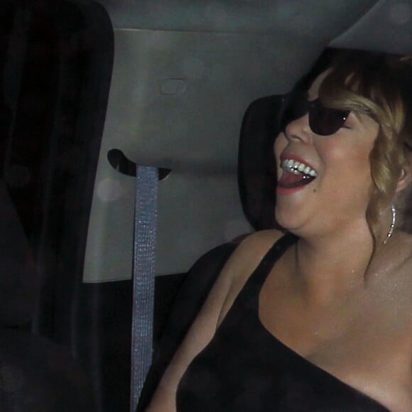 Mariah Carey, toute souriante, en sortant de son dîner au Mr Chow restaurant à Beverly Hills, le 2 août 2016.