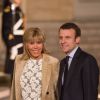 Le ministre de l'économie, de l'industrie et du numérique Emmanuel Macron et sa femme Brigitte Trogneux - Dîner d'état donné en l'honneur du roi Willem-Alexander et la reine Maxima des Pays-Bas au palais de l'Elysée à Paris, le 10 mars 2016.