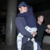 Orlando Bloom avec son fils Flynn et sa compagne Katy Perry arrivent à l'aéroport LAX de Los Angeles, Californie, Etats-Unis, le 9 août 2016
