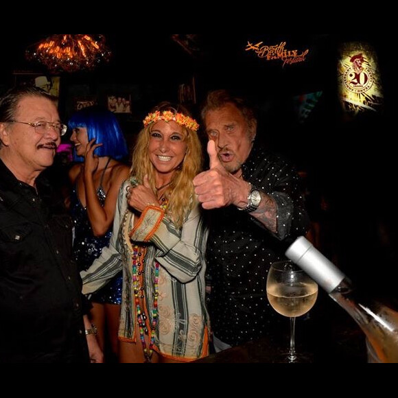 Bruno Magras, Carole Gruson et Johnny Hallyday au Ti St Barth à Saint-Barthélemy le 12 août 2016
