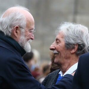 Nicolas Seydoux et Jean Rochefort lors des obsèques de Danièle Delorme en l'église de Saint-Germain-des Prés à Paris le 23 octobre 2015