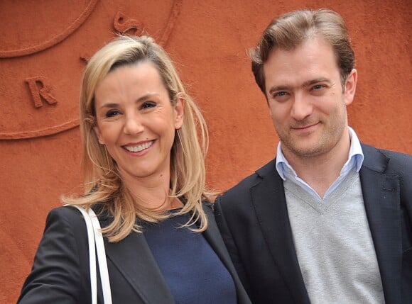  Laurence Ferrari et son mari Renaud Capuçon posant au village des Internationaux de France de tennis de Roland Garros à Paris, le 3 juin 2014. 
