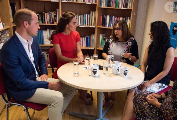 Le prince William et Kate Middleton visitent un centre d'assistance caritatif à Londres le 25 août 2016.