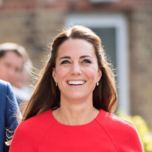 Le prince William et Kate Middleton visitent un centre d'assistance caritatif à Londres le 25 août 2016.