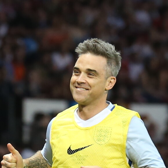 Robbie Williams - Match de football caritatif au stade Old Trafford à Manchester, le 5 juin 2016.