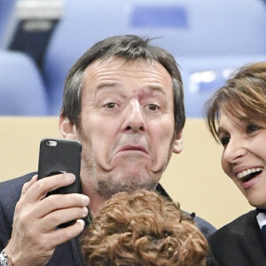 Jean-Luc Reichmann et sa femme Nathalie au match de qualification pour la Coupe du Monde 2018, "France-Bulgarie" au Stade de France de Saint-Denis, le 7 octobre 2016