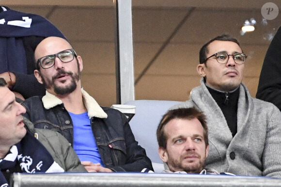Arnaud Ducret, Cartman et Brahim Asloum au match de qualification pour la Coupe du Monde 2018, "France-Bulgarie" au Stade de France de Saint-Denis, le 7 octobre 2016