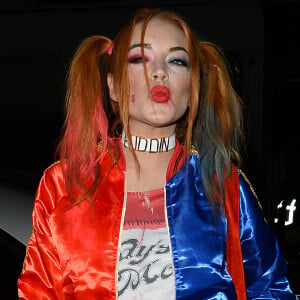 Lindsay Lohan (déguisée en Harley Quinn du film Suicid Squad) arrive à une fête d'Halloween à Londres, le 31 octobre 2016.