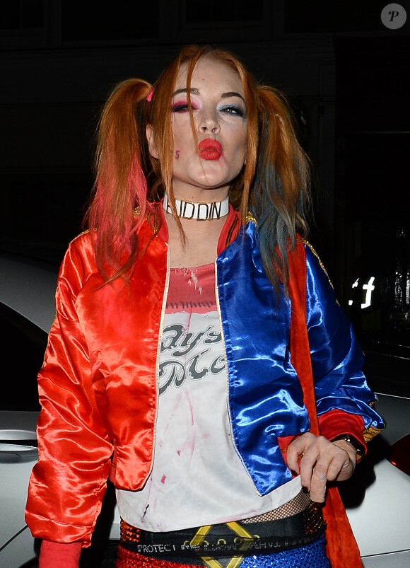 Lindsay Lohan (déguisée en Harley Quinn du film Suicid Squad) arrive à une fête d'Halloween à Londres, le 31 octobre 2016.