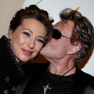 Laura Smet et son père Johnny Hallyday à Paris, le 13 décembre 2011.