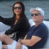 Catherine Zeta-Jones et son mari Michael Douglas sortent du restaurant Bagatelle, avant de remonter à bord d'un zodiaque, à Saint-Tropez, le 23 juillet 2016.